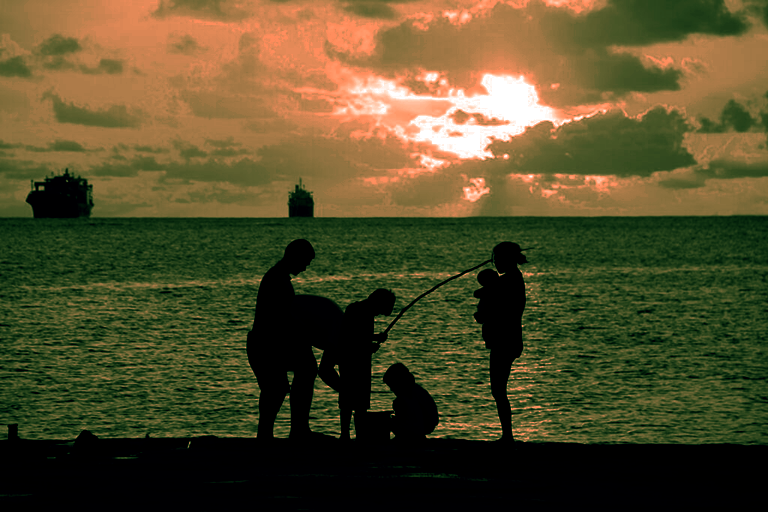 A family spends quality time at the Garapan Fishing Base on Saipan. 